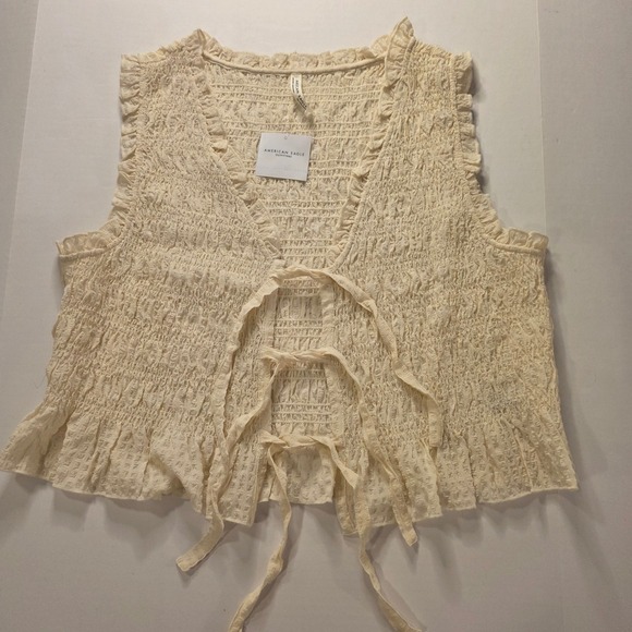 American Eagle Outfitters Tops - American Eagle Smocked Tie Front‎ Vest Cream Ruffle Trim Boho XL New With Tags